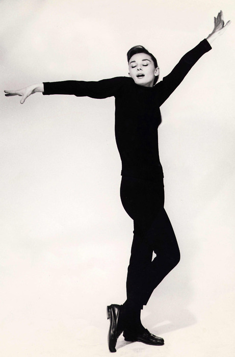 Funny Face was a milestone in fashion. An entertaining film with tasteful costumes, Audrey Hepburn's style and outfits included cigarette pants and top. An all black killer!