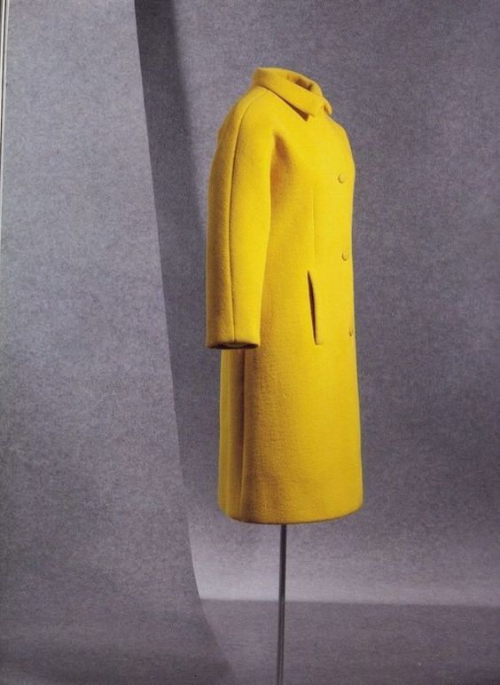 Knee-length yellow coat worn by Bunny Mellon during the 60s.