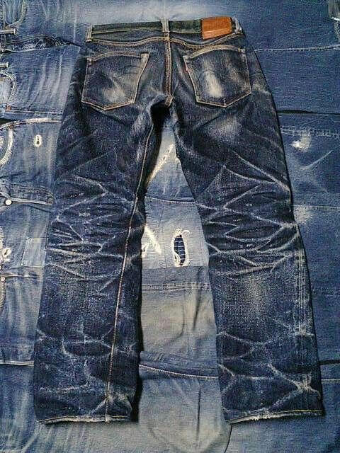 A pair of faded blue jeans by Samurai. You will see electric blue fades.